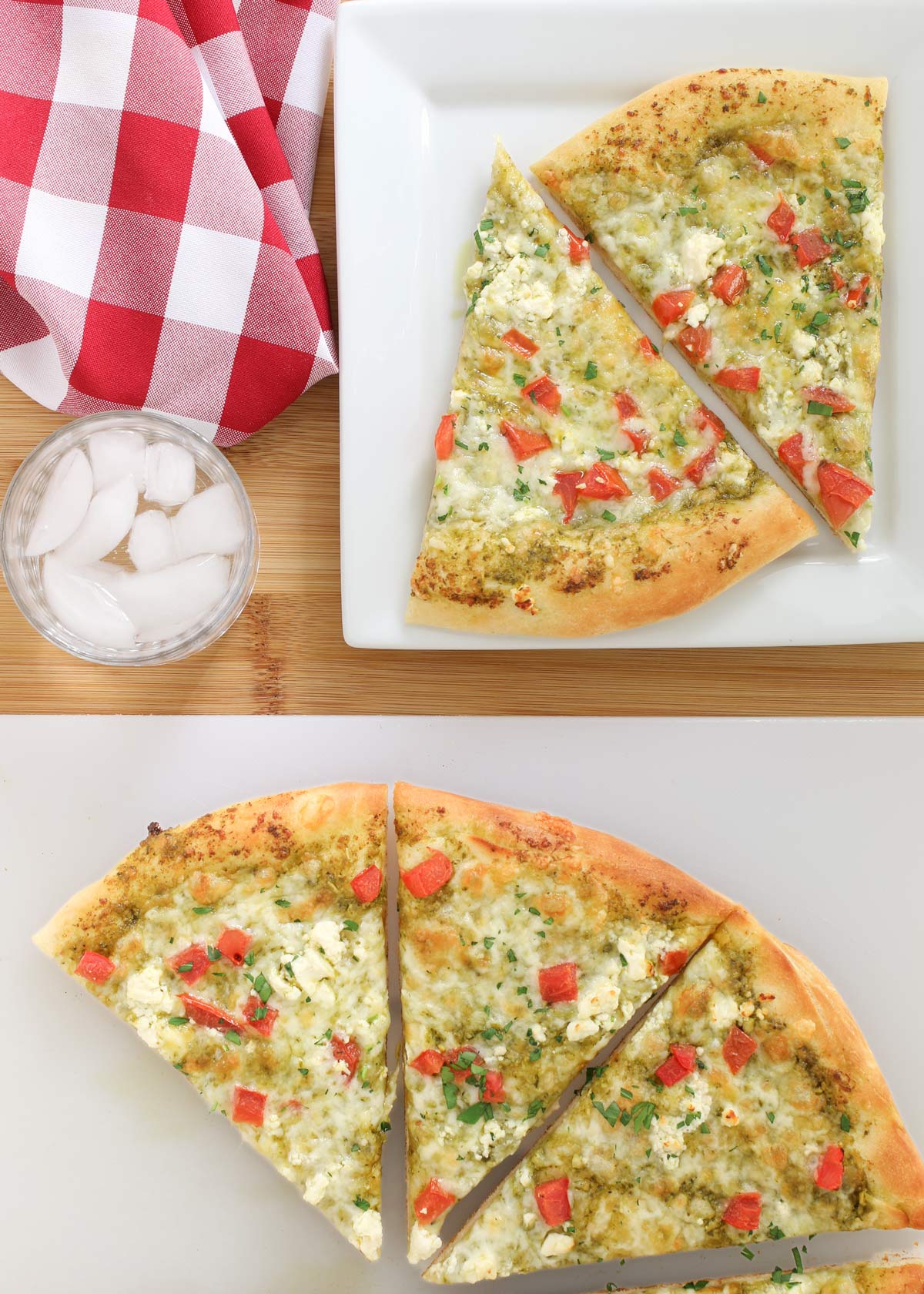 slices of homemade pizza on a cutting board and a nearby square plate with a red checked cloth and a drink in a glass.