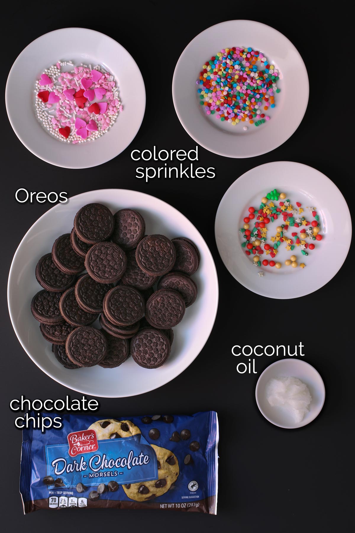 ingredients for making chocolate dipped oreos laid out on a table.