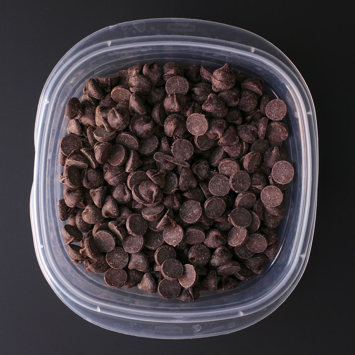 chocolate chips in plastic container.