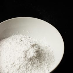 white bowl of homemade powdered sugar