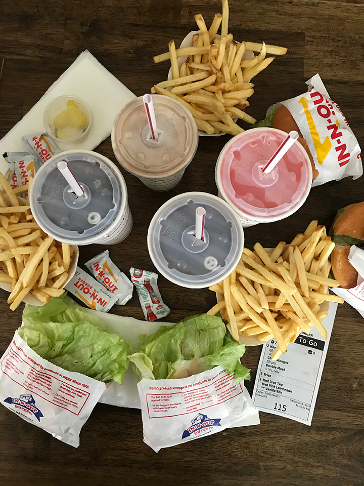 takeout burgers, fries, and drinks