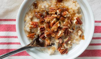 bowl of oats with spoon and red striped napkin