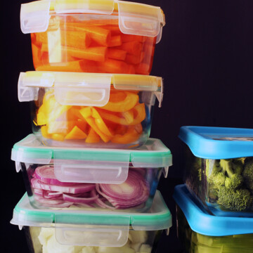 glass containers full of prepped vegetables