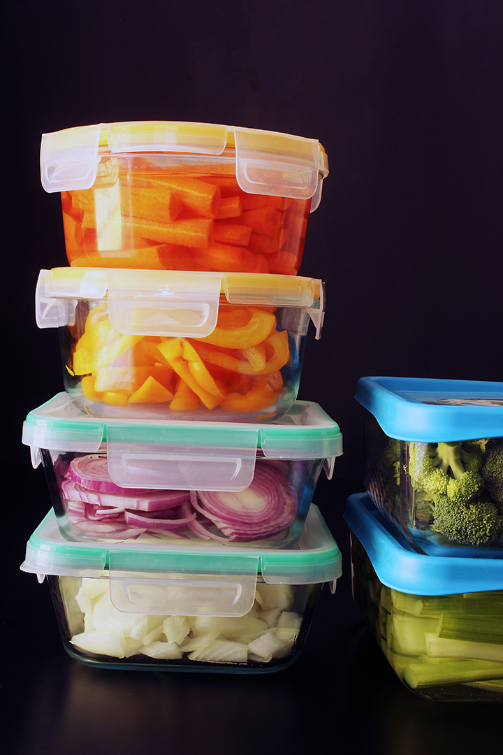 glass containers full of prepped vegetables