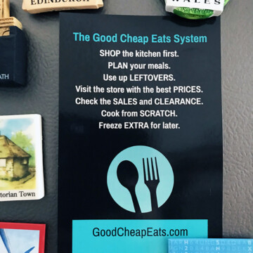 printed card of GCE system on refrigerator with magnets
