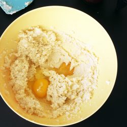 adding eggs to butter mixture