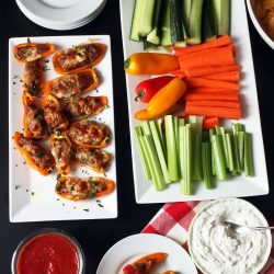 sausage peppers and sauce on appetizer table