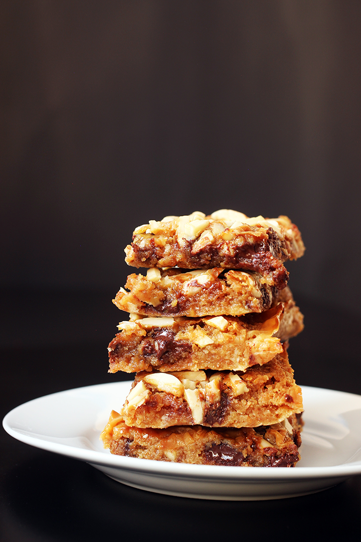 Did You Know There are Over 6,561 Ways to Make Magic Bars?! | Good Cheap Eats stack of nutella magic bars on a white plate