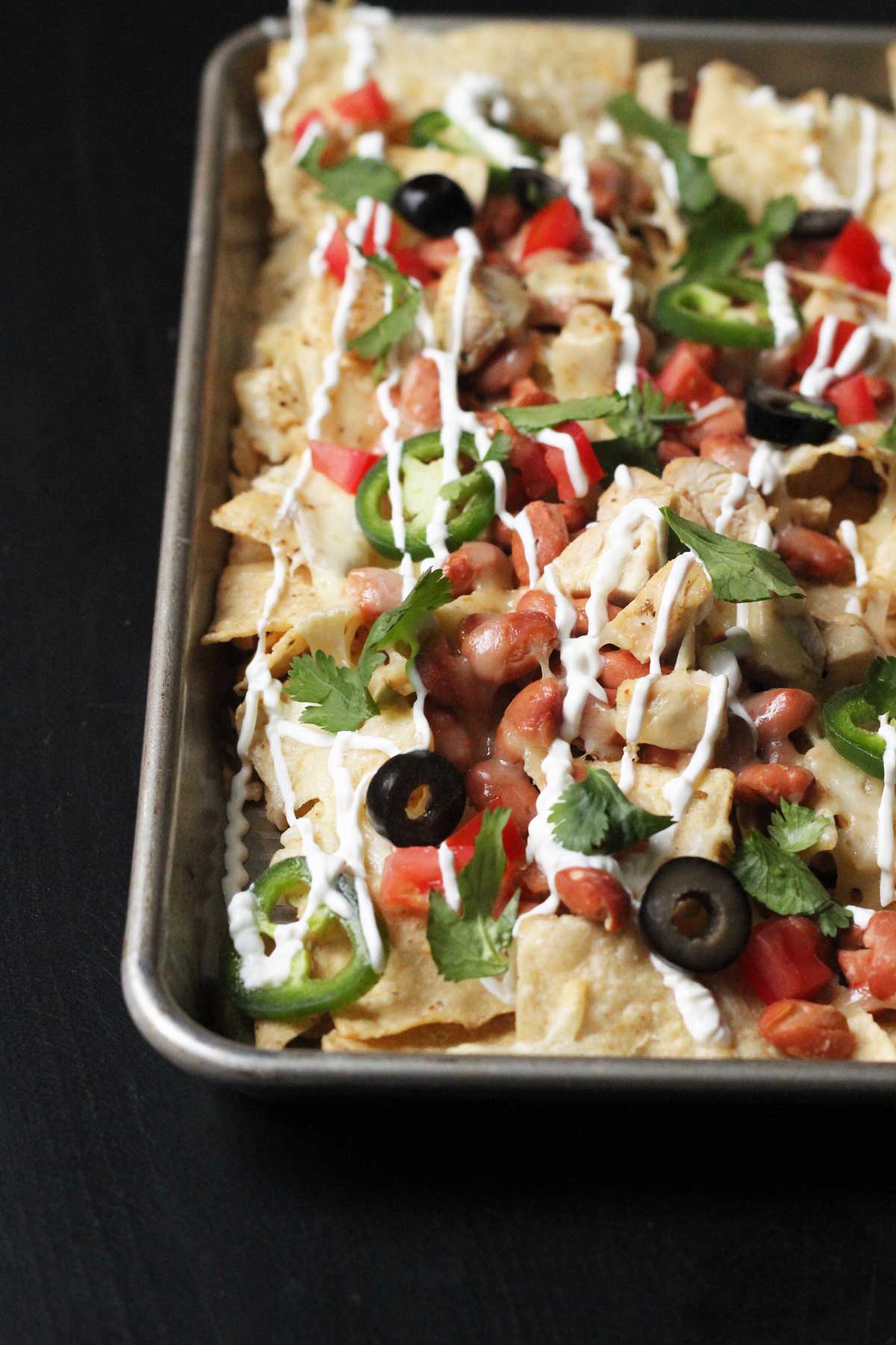 one pan chicken nachos with toppings