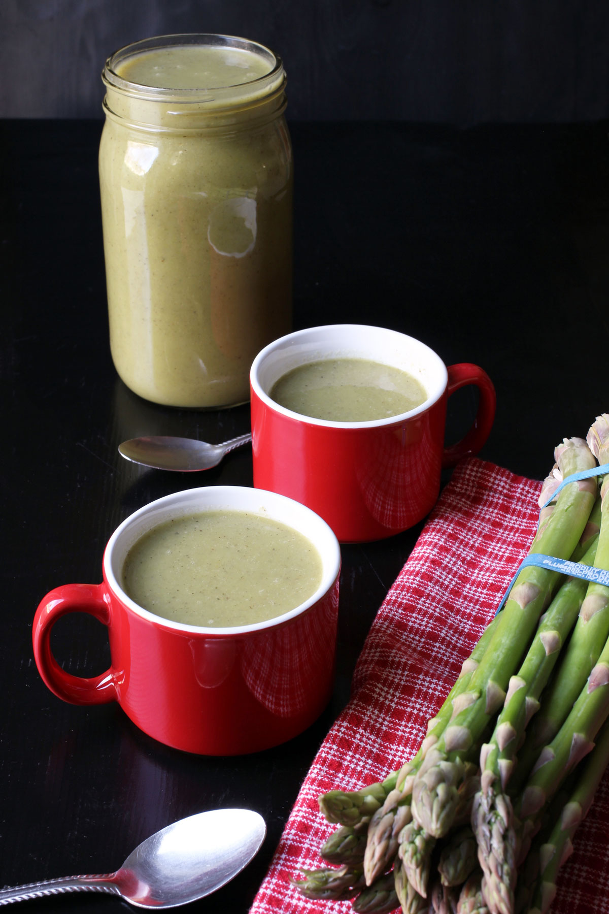 asparagus soup in jar and mugs
