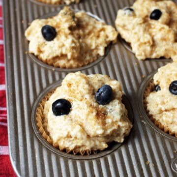 blueberry muffins unbaked in tin