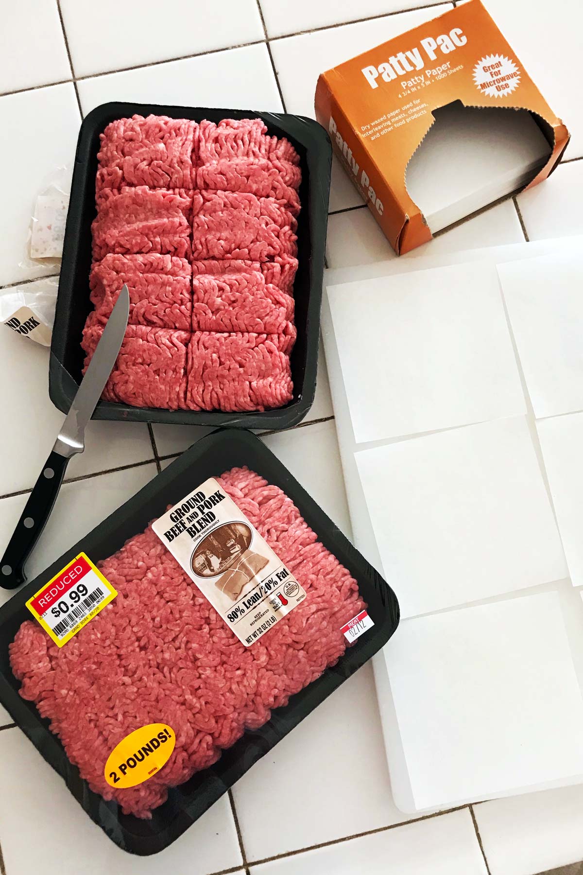 prepping ground beef on counter top.