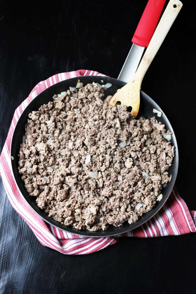 cooked seasoned ground beef in skillet