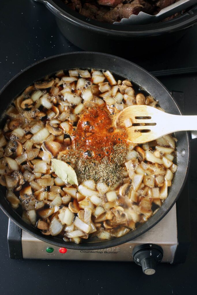 adding spices to skillet