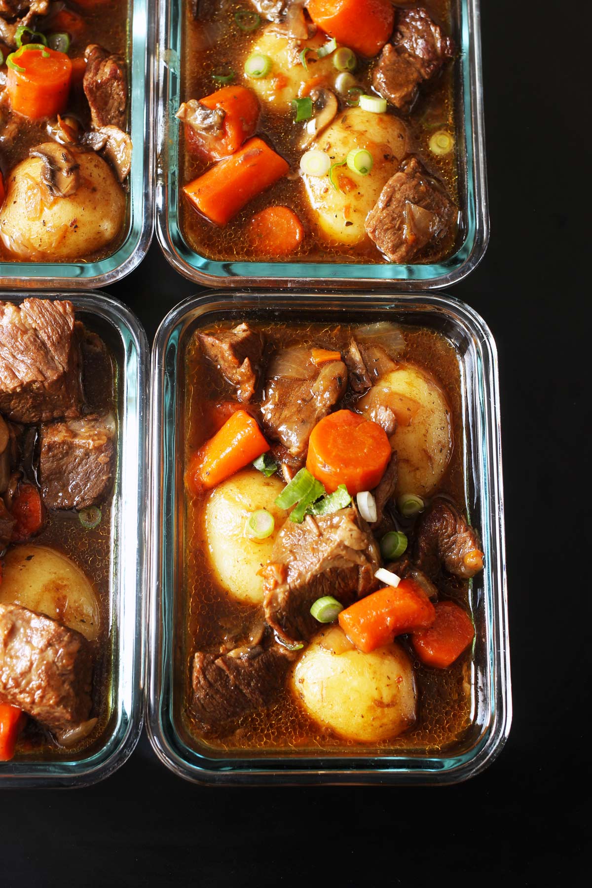 close-up of beef stew in meal prep containers