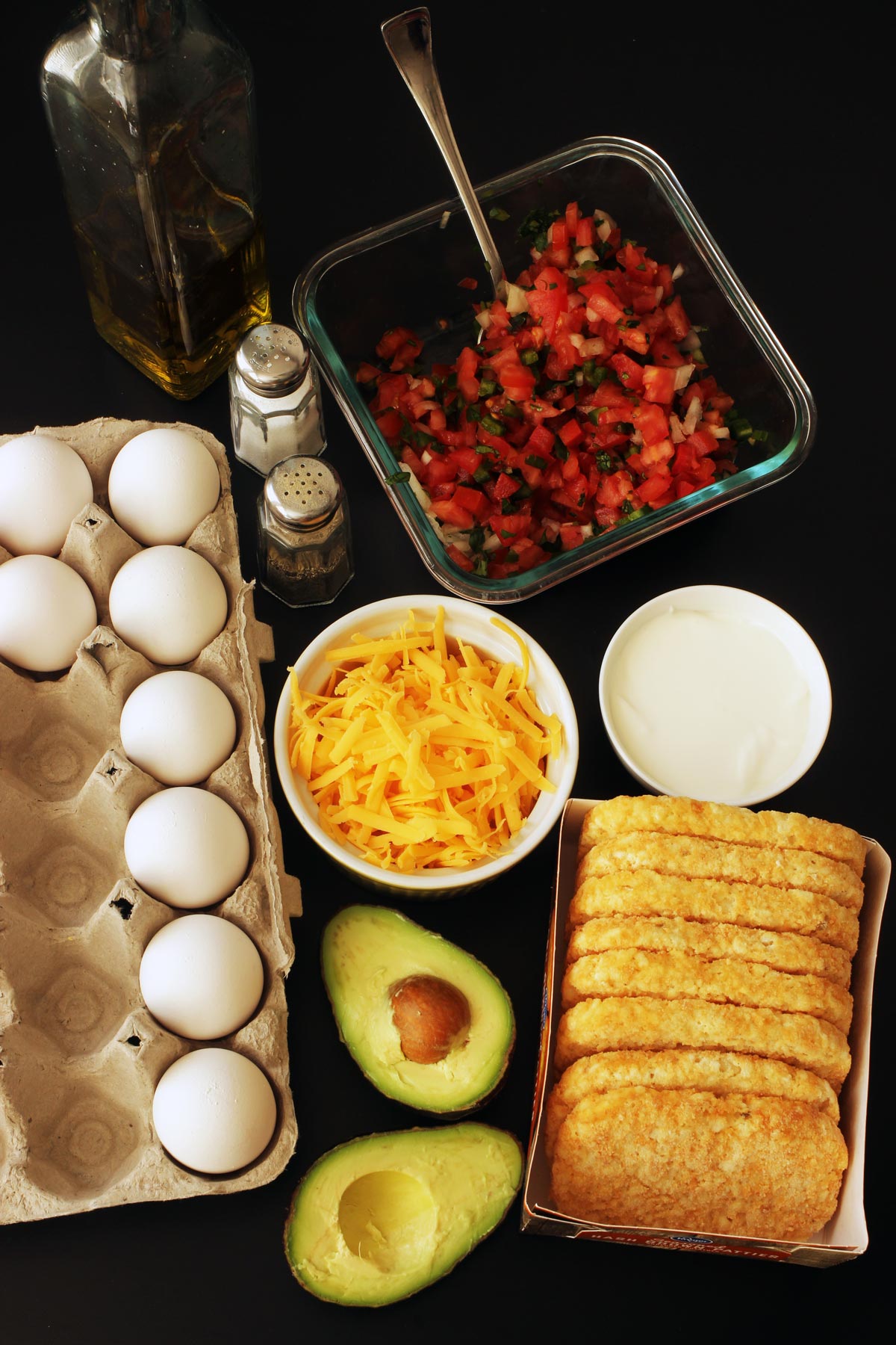 breakfast ingredients laid out on table top.