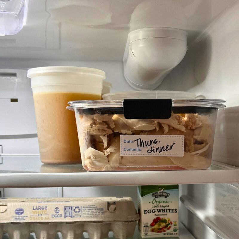 leftovers on top shelf of fridge.