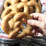 choosing a pretzel from the basket