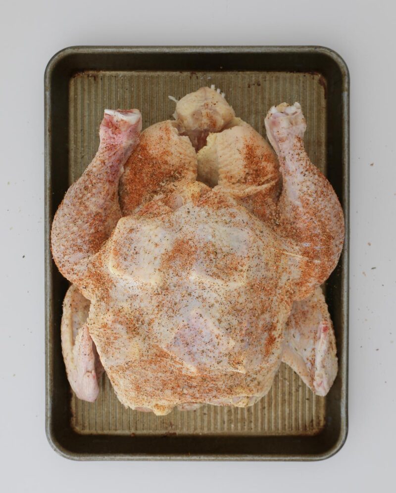 the chicken with knobs of butter under the skin and seasoned salt atop.