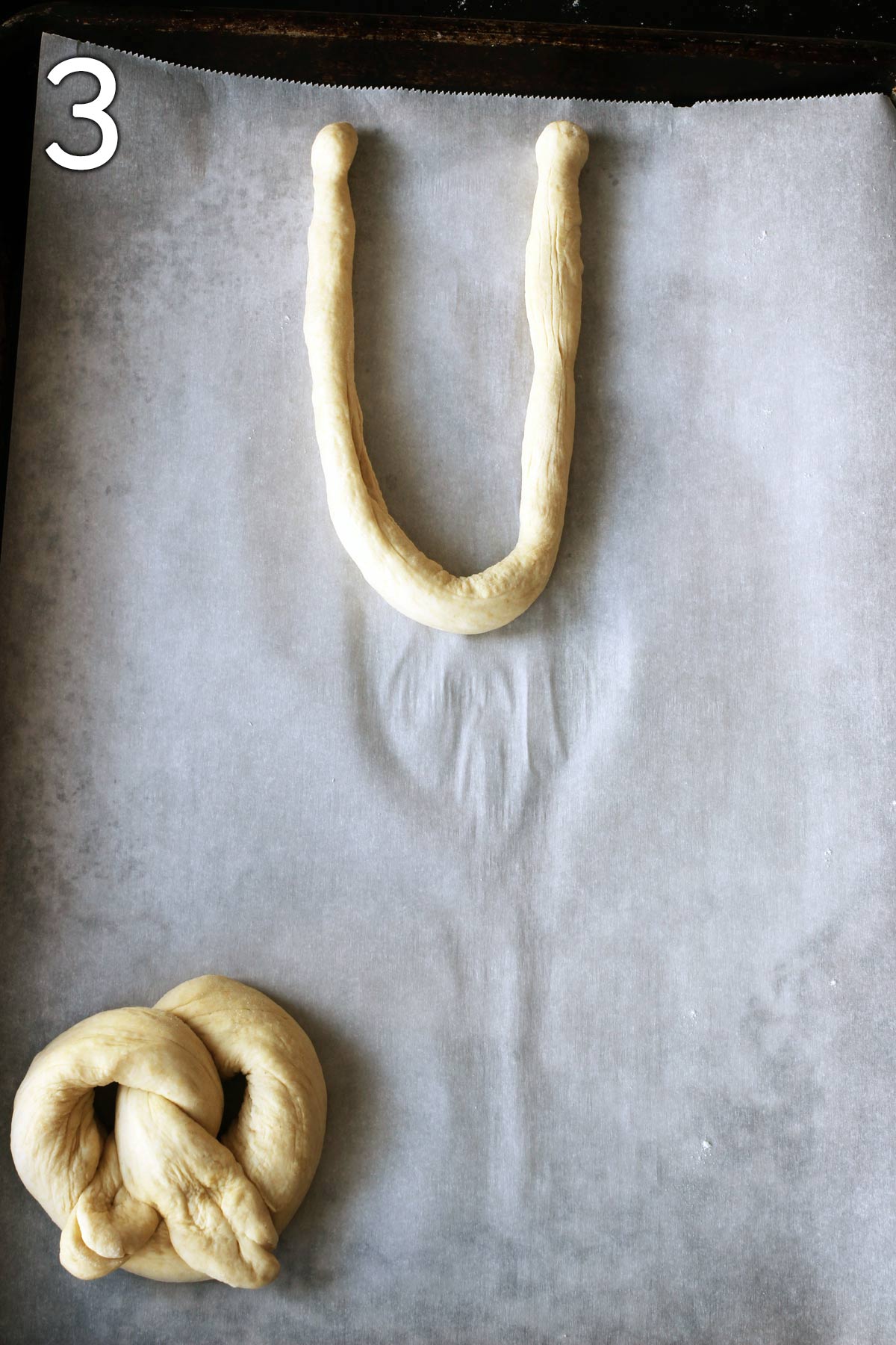 snake of dough shaped into a horseshoe.