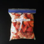 ziptop freezer bag of frozen strawberries.