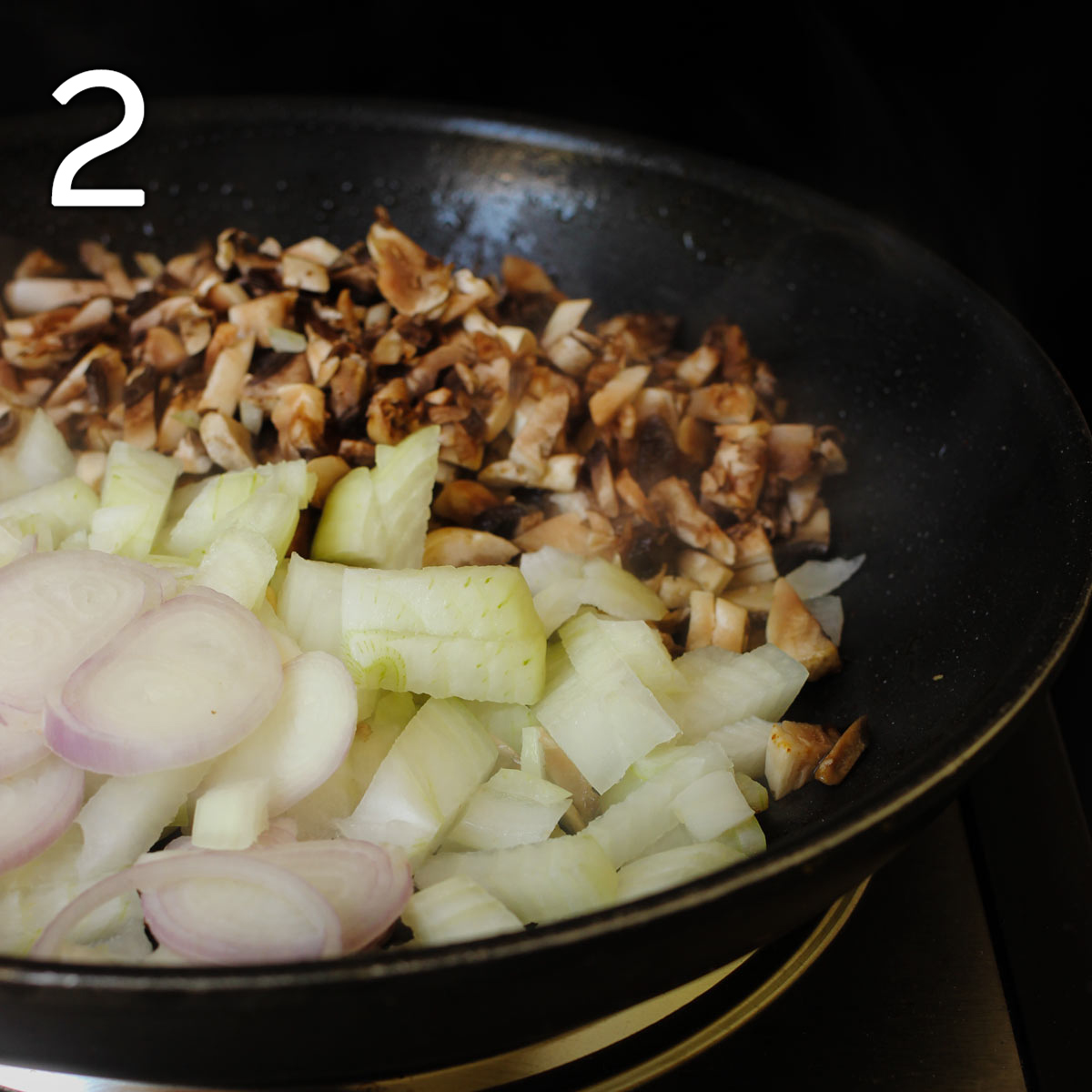 chopped onions, shallots, and mushrooms in skillet.