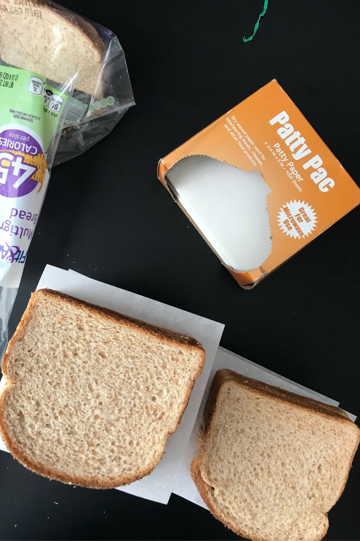 sliced bread for sandwiches separated by patty papers to freeze in portion sizes.