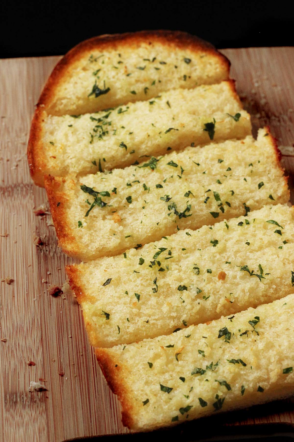 garlic butter melted and baked into a large loaf of sliced garlic bread.