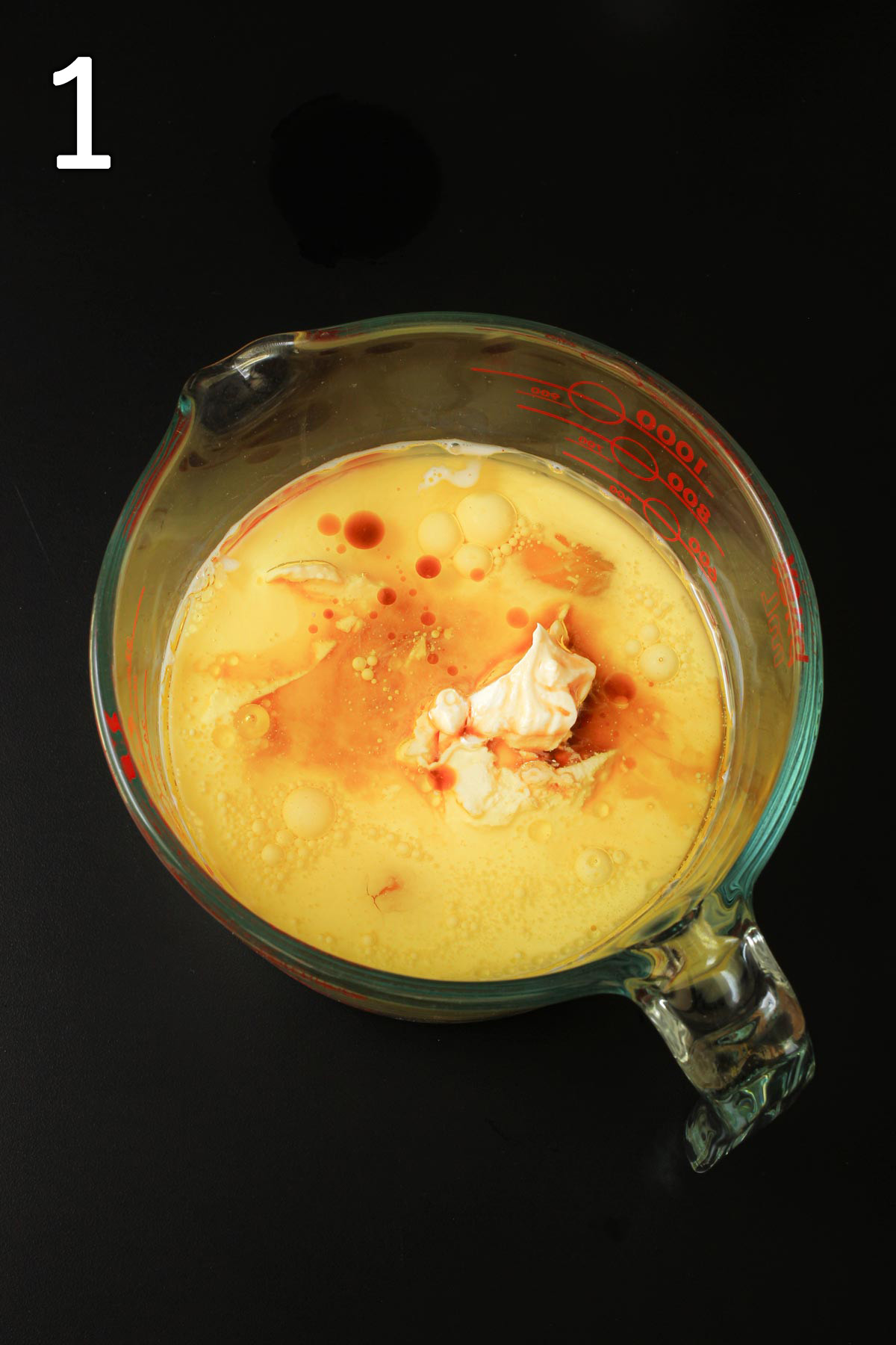 milk, yogurt, egg, and vanilla extract in large pyrex mixing bowl.