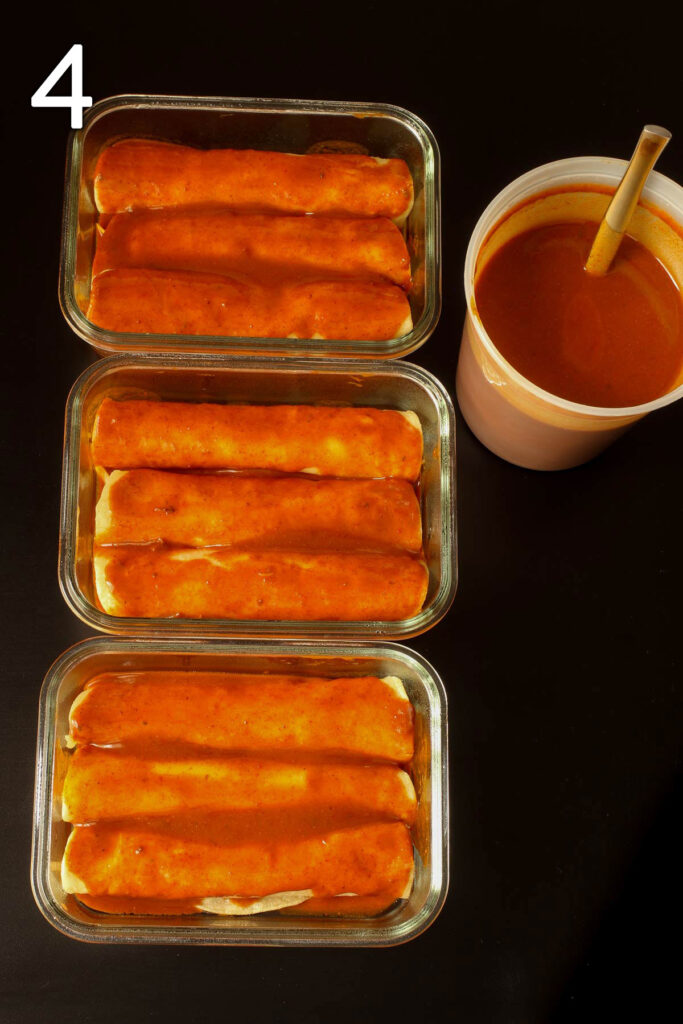 three small pans of assembled and sauced enchiladas.