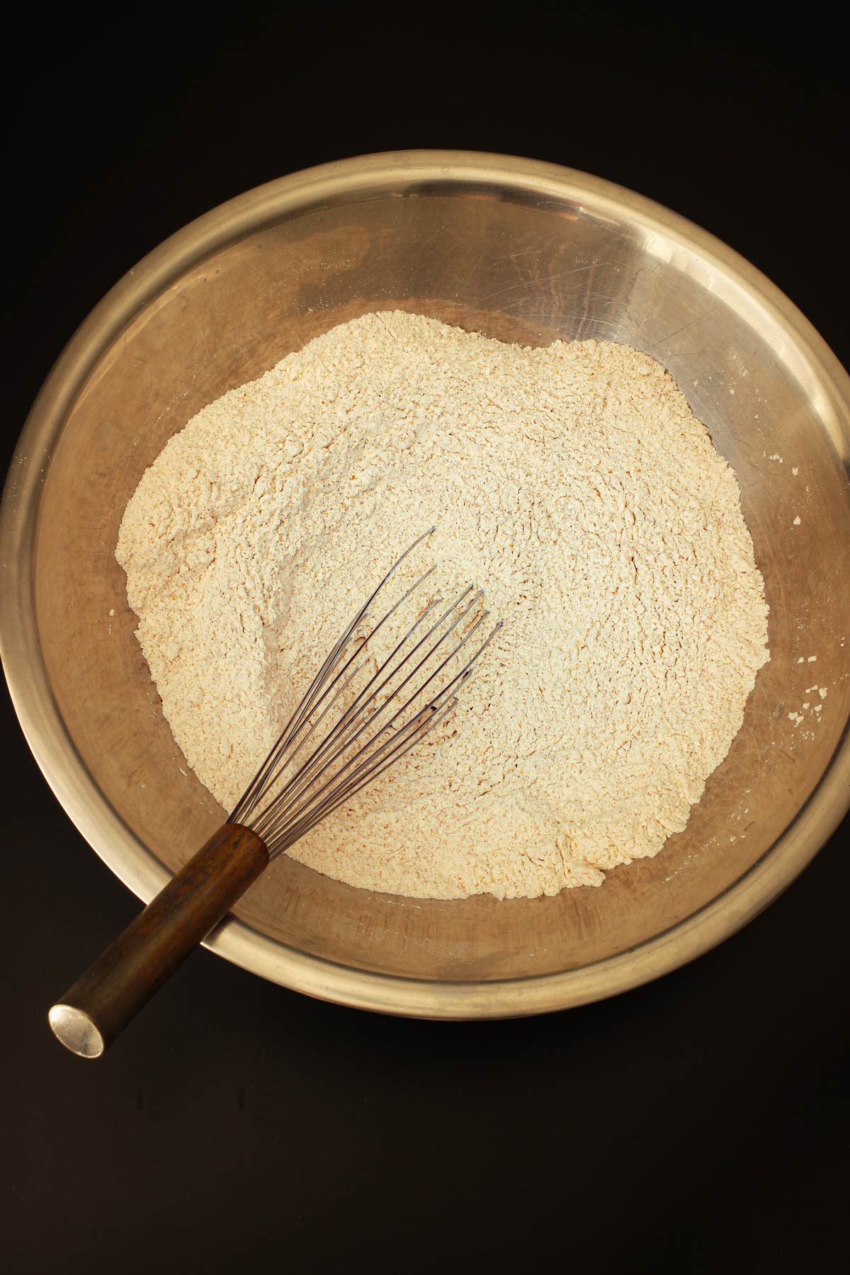 dry ingredients whisked together in large metal mixing bowl.