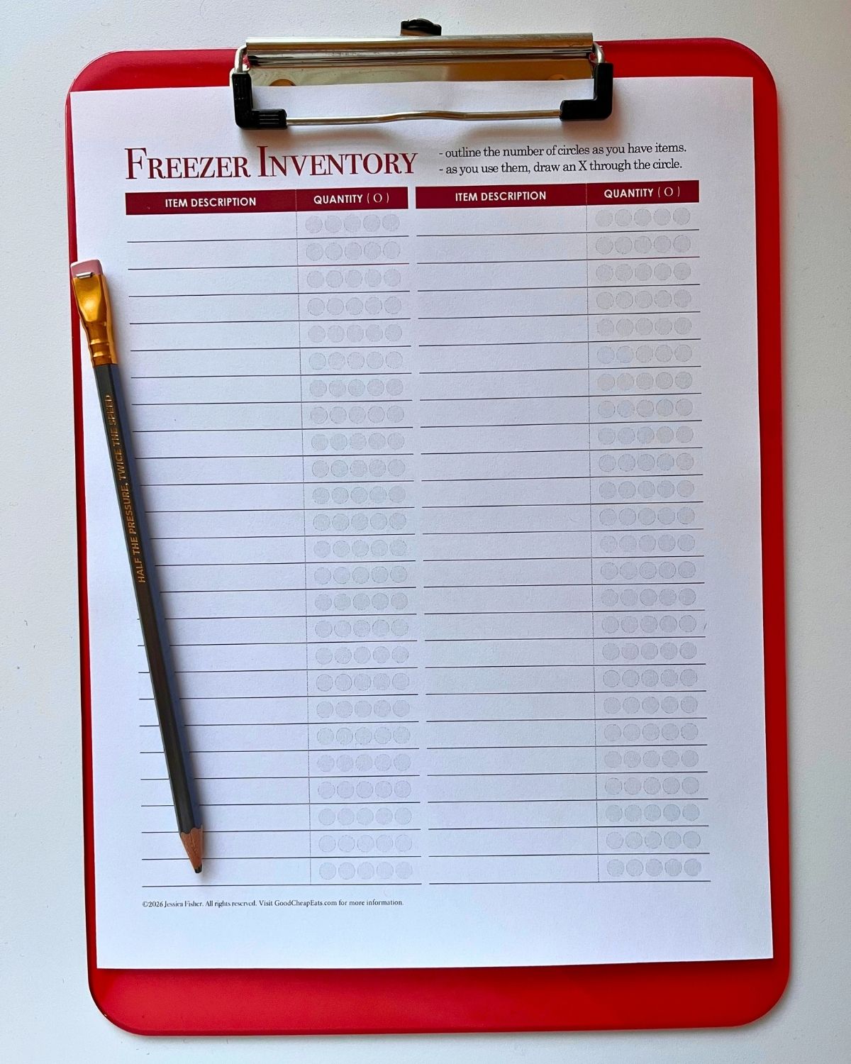printed freezer worksheet on red clipboard with a pencil.