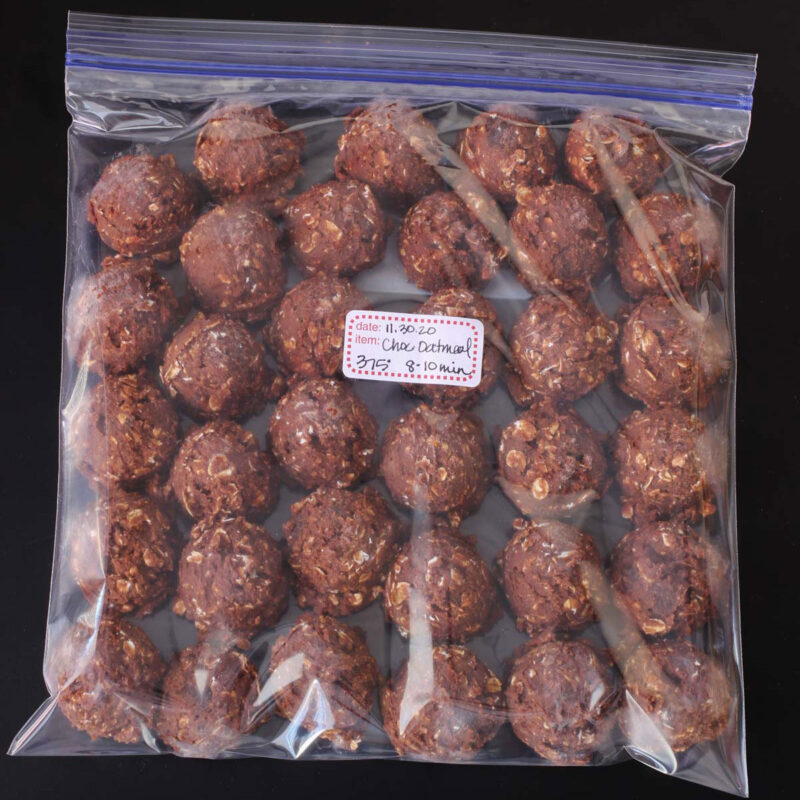 frozen cookie dough balls in ziptop freezer bag.
