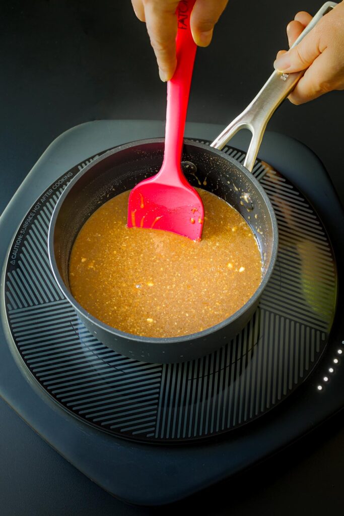 liquid ingredients mixed together in sauce pan.