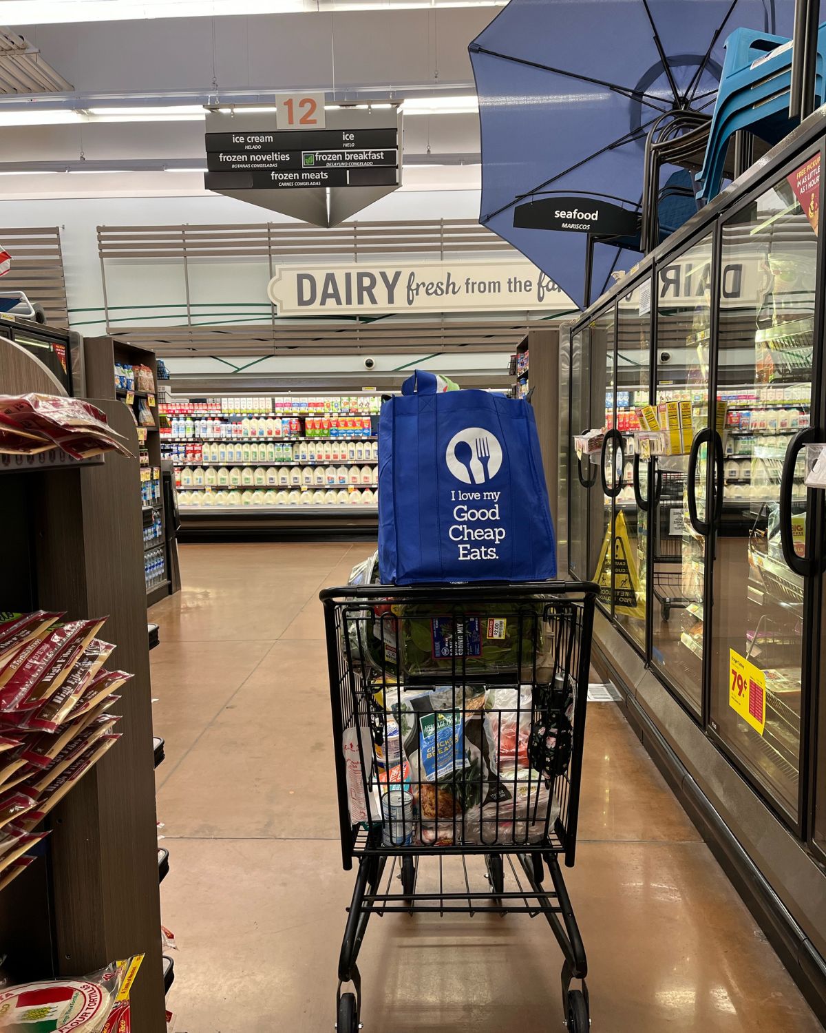 good cheap eats grocery bag on cart in grocery store.