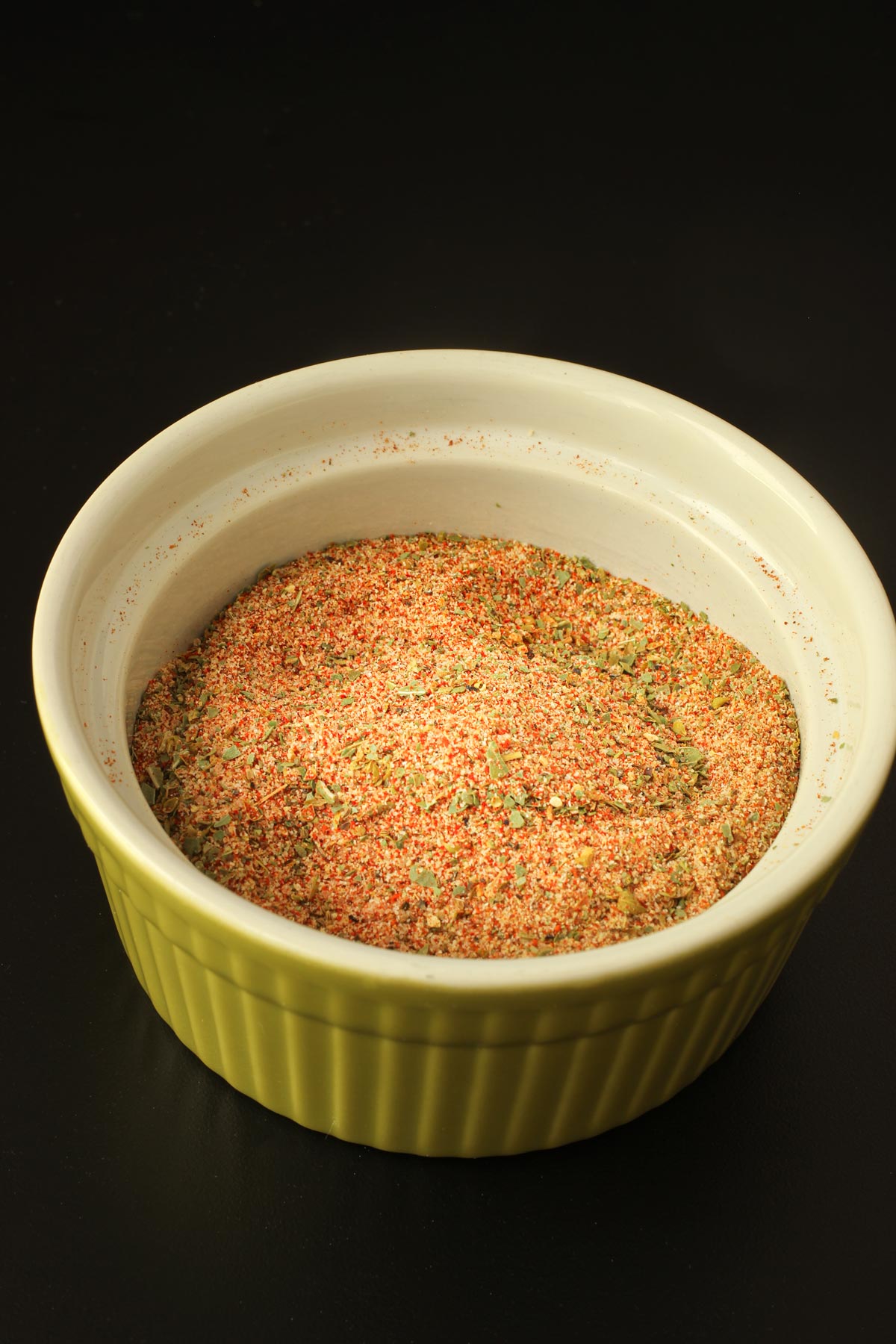 Jamie's spice mix in a small green bowl.