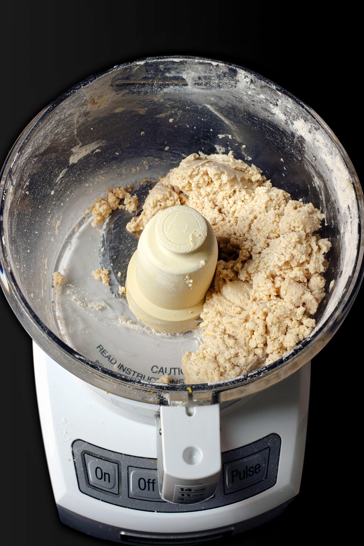 crumbs formed in bowl of food processor.