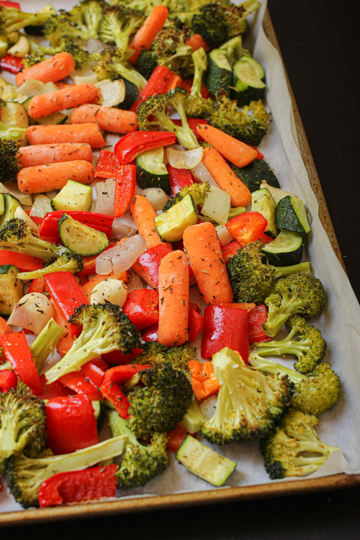 roast mixed vegetables on lined sheet pan.