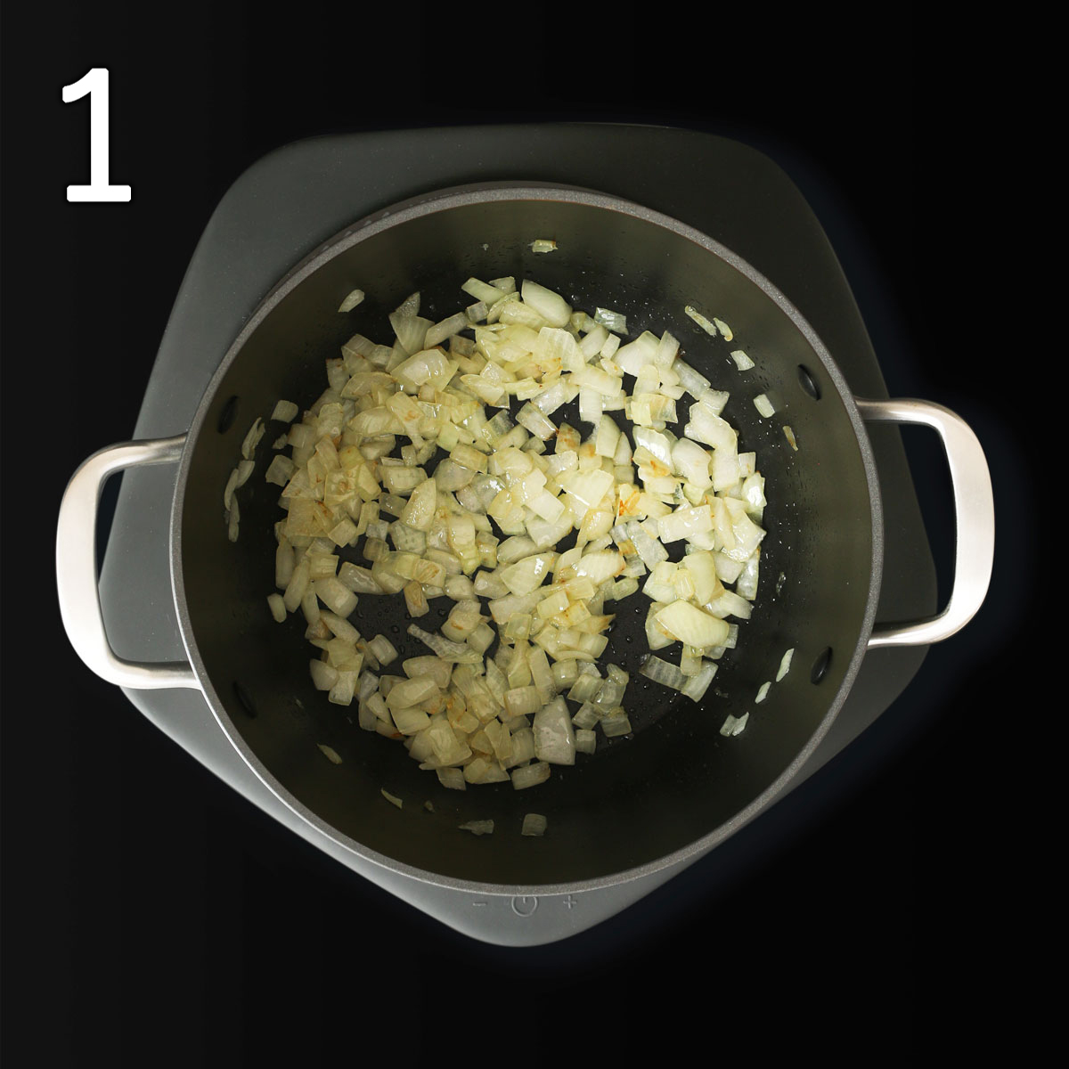 sautéing onions and garlic in heavy pot on medium heat.