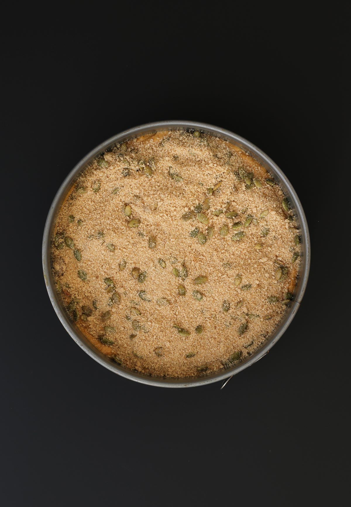 crumb mixture added atop the cake batter in the pan.