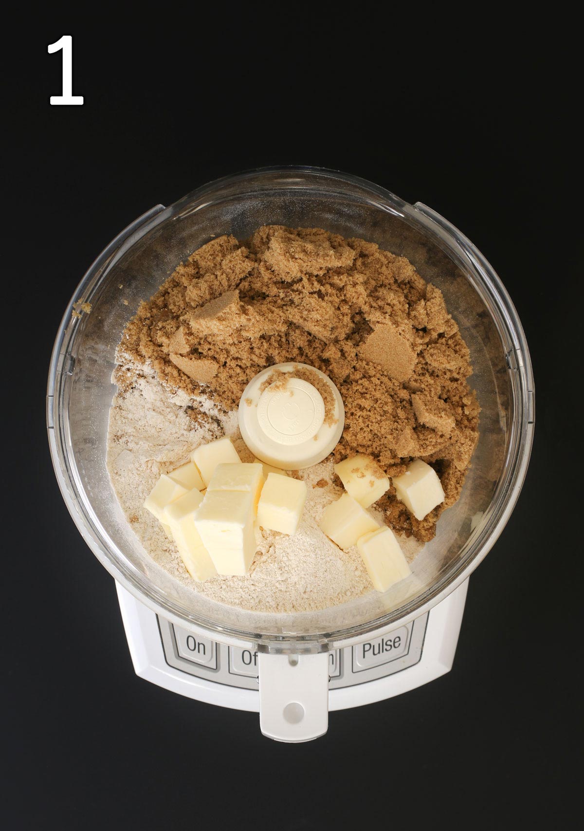 sugar, butter, and flour in food processor bowl.