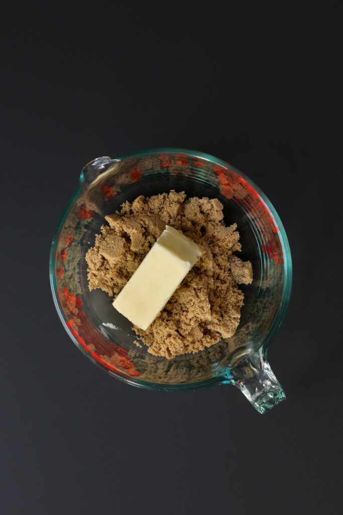 butter and sugar in mixing bowl.