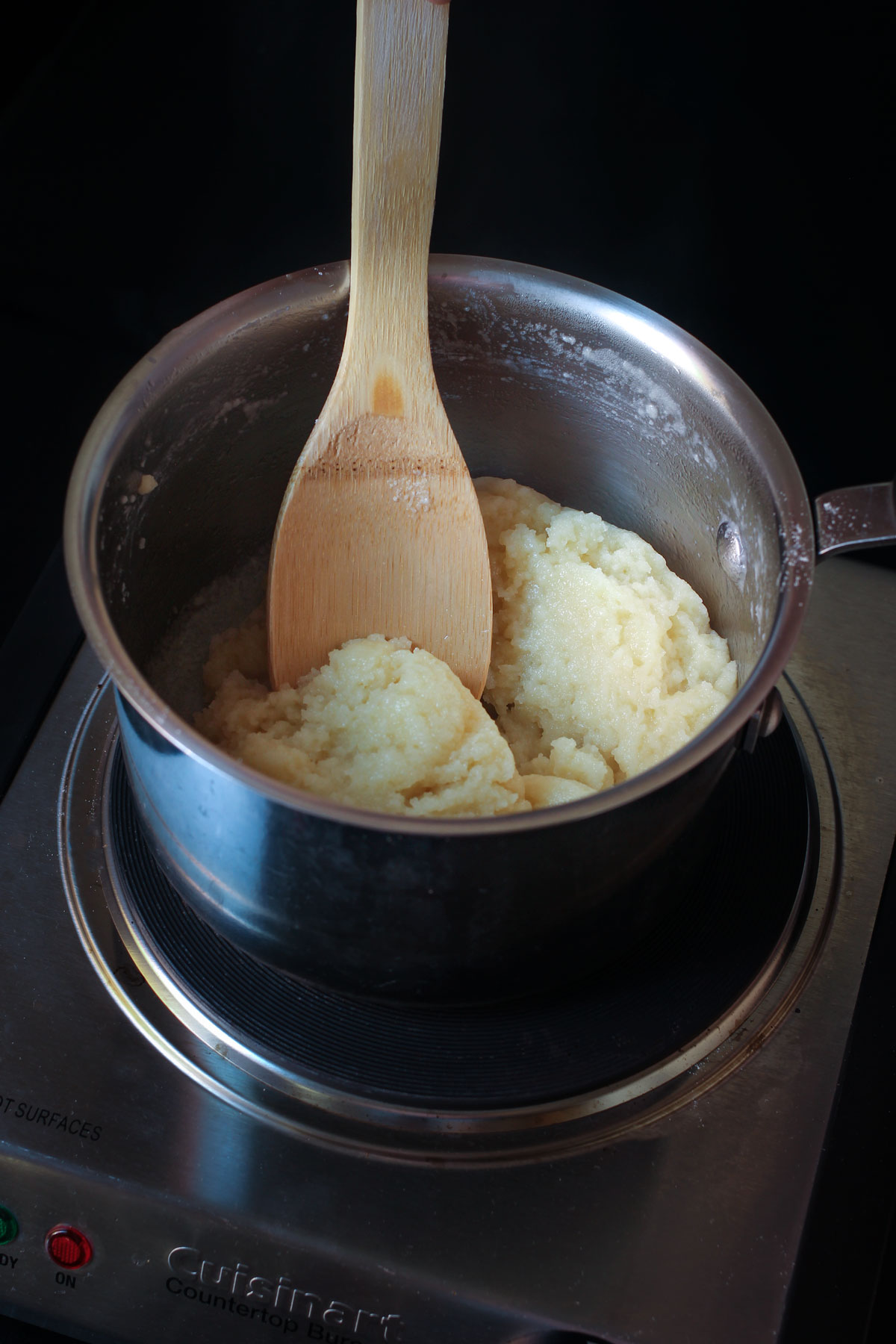 stirring together the butter-water with flour and salt in saucepan.