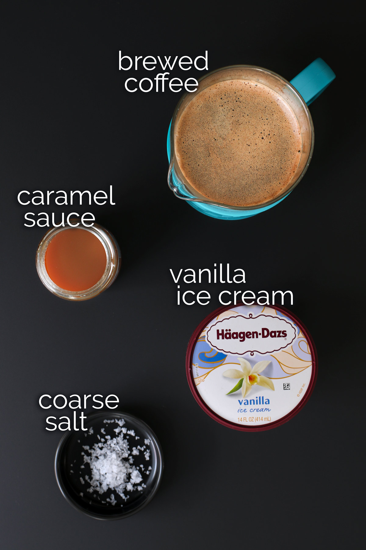 ingredients for affogato recipe laid out on black table.