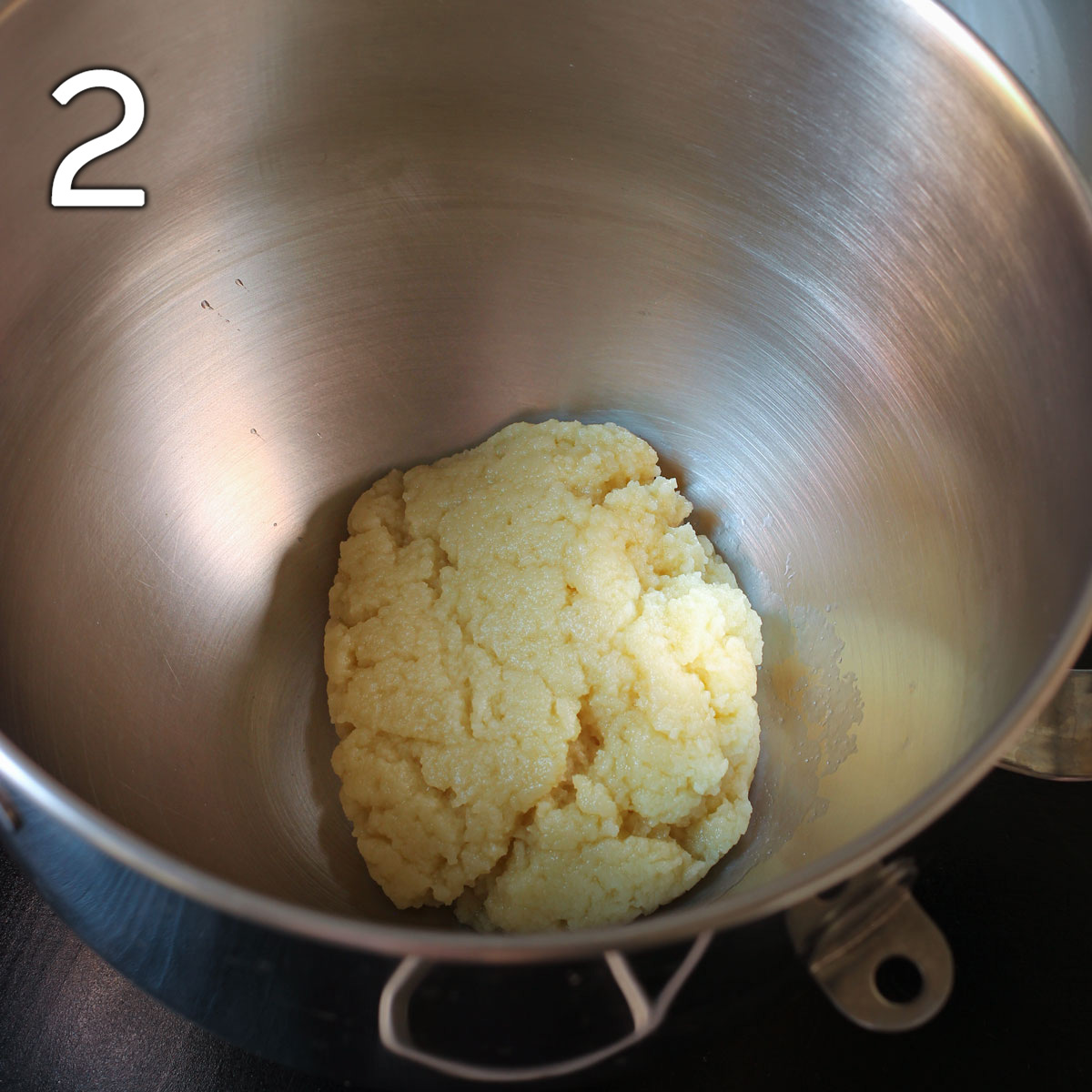 flour dough transferred to the bowl of a stand mixer.