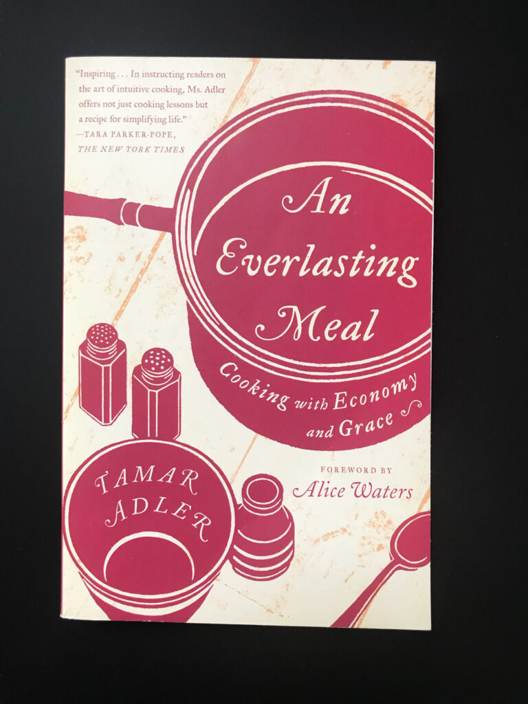 copy of an everlasting meal book on black table.