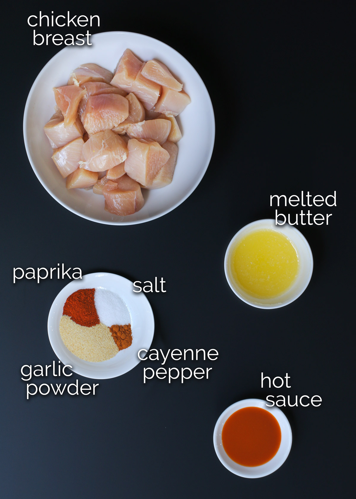 ingredients for buffalo chicken bites laid out on a table.