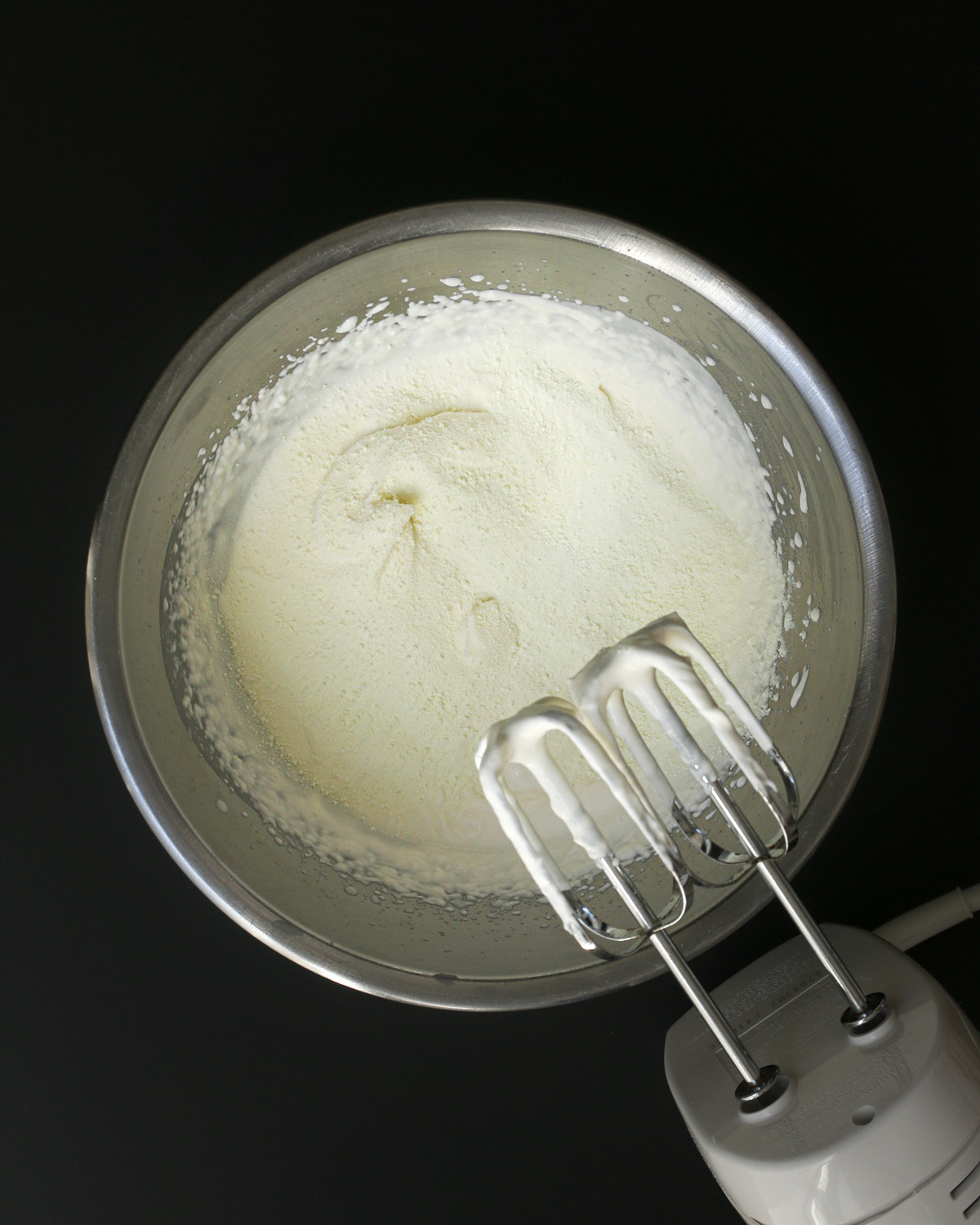 dry milk powder sprinkled across the top of the whipped cream.