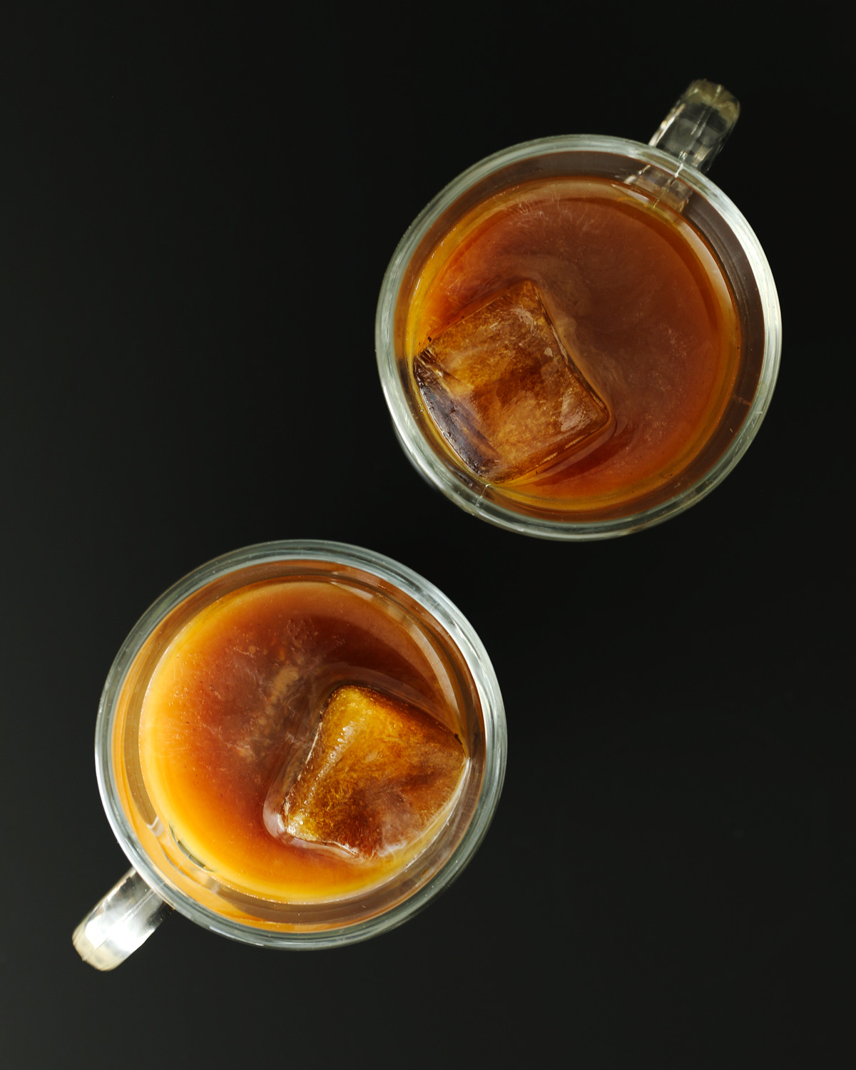 overhead shot of two glasses of baileys iced coffee.