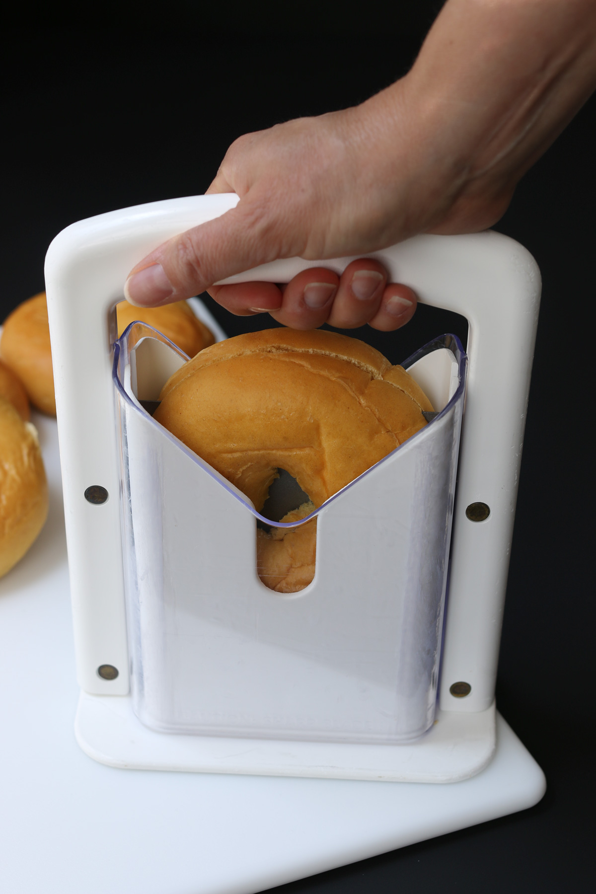 cutting bagels with guillotine.